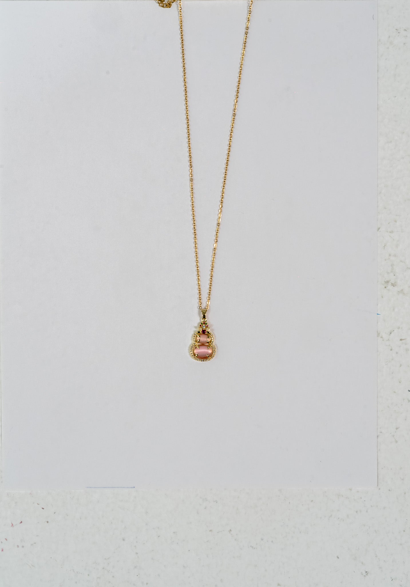Elegant Gold Pendant Necklace with Pink Gemstone