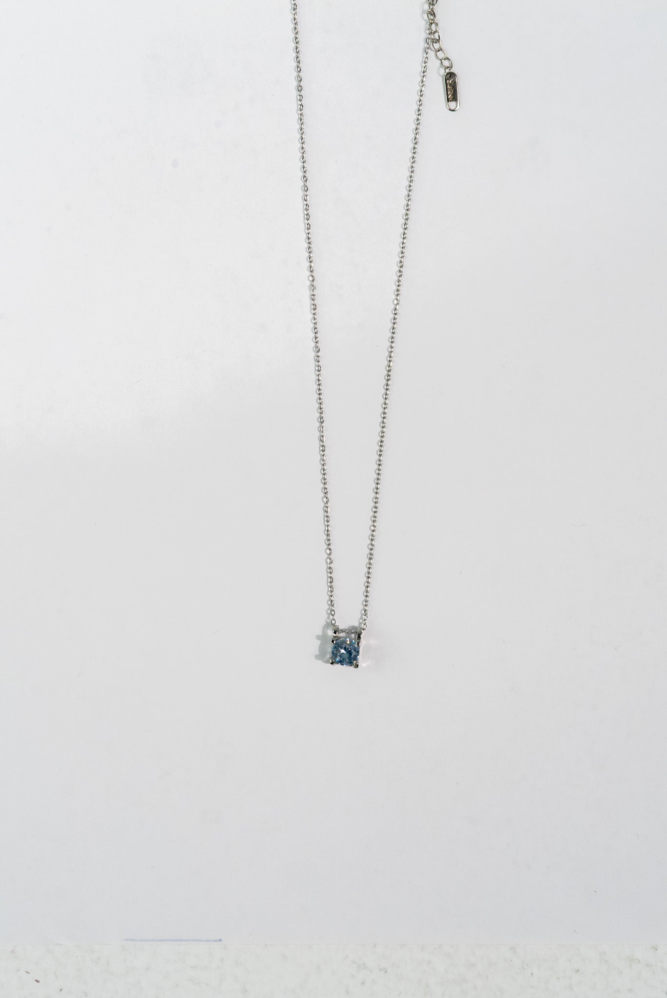 Elegant Silver Pendant Necklace with Blue Gemstone
